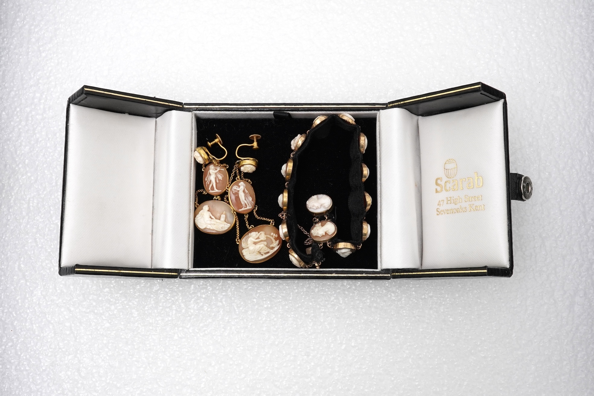 A pair of shell cameo earrings and bracelet, 19th century